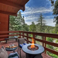 Skyforest Getaway deck and fire table among the pines