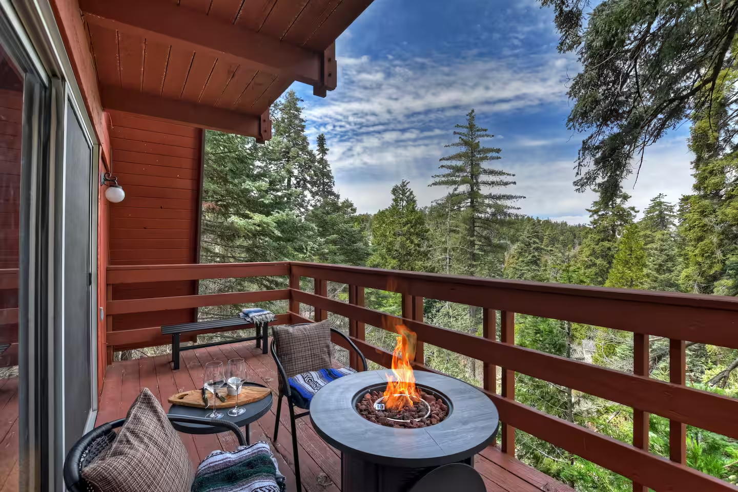 Skyforest Getaway deck firepit with forest view